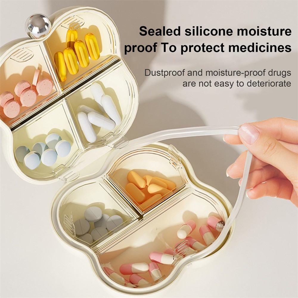 Mini gyógyszer- és ékszerszervező 7 rekesszel - virágos rózsaszín