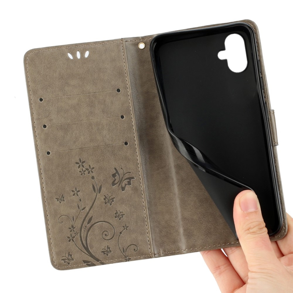 Virágok könyv tok Samsung Galaxy A06 4G készülékhez - szürke