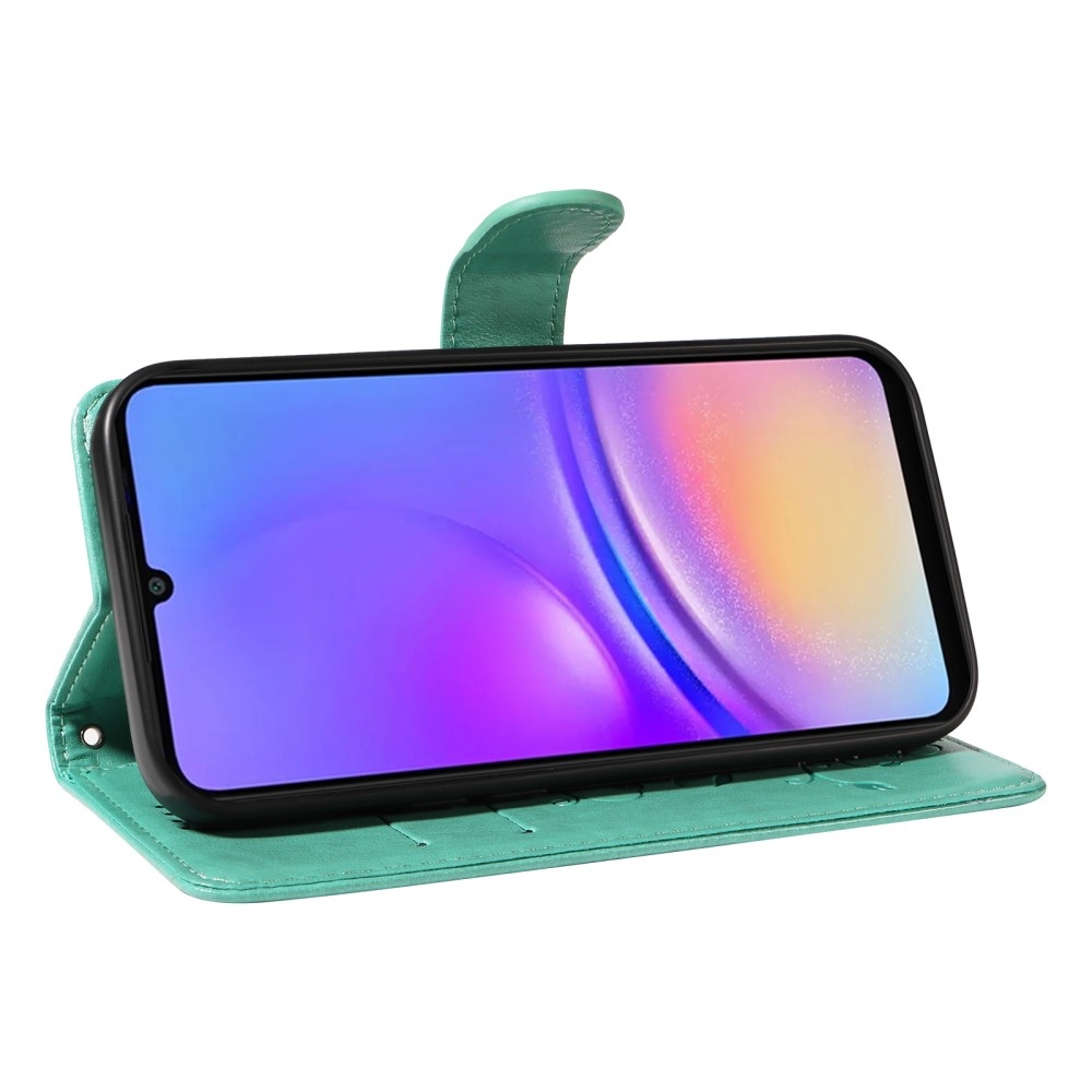 Virágos könyves tok Samsung Galaxy A06 4G készülékhez - teal színű