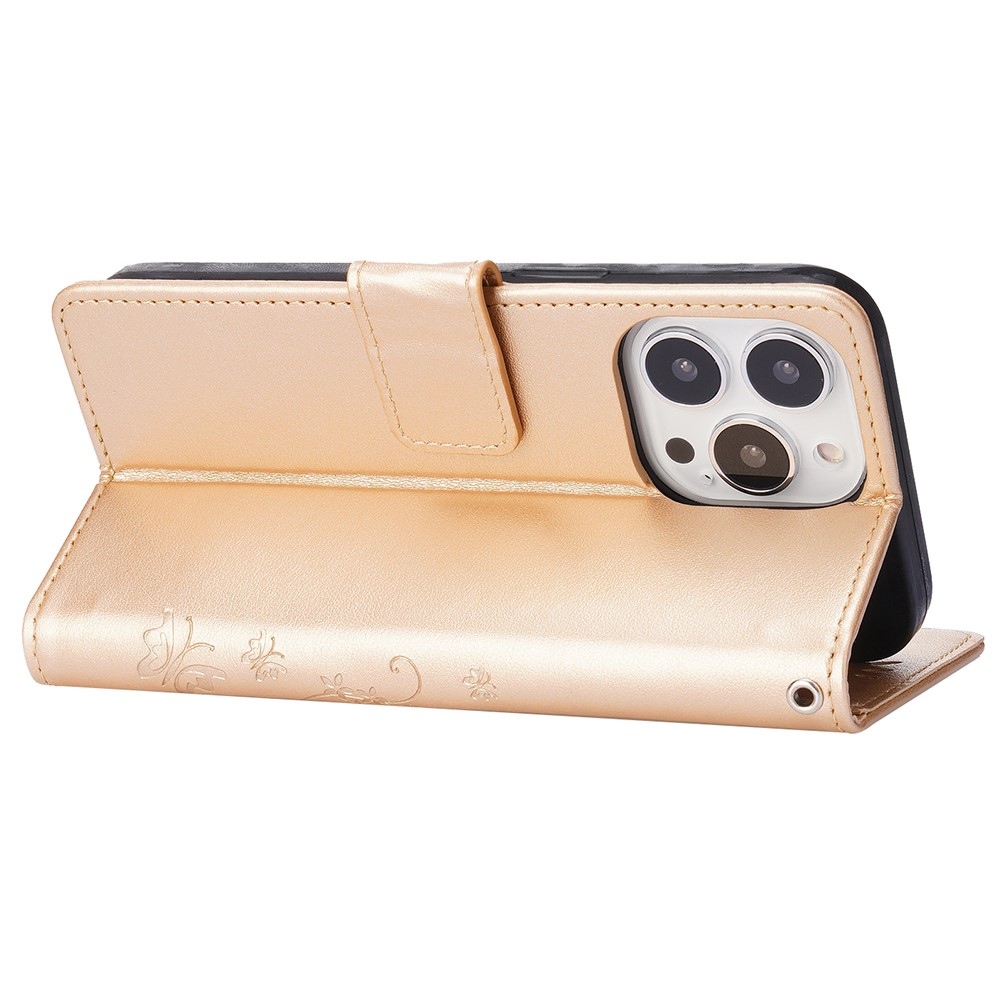 Virágok könyv tok iPhone 15 Pro készülékhez - arany