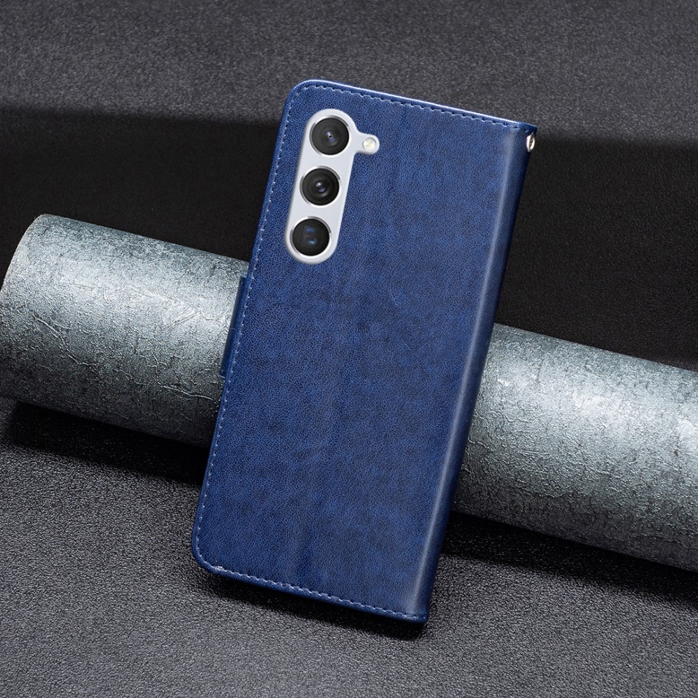 Pillangó könyv tok Samsung Galaxy S24 készülékhez - sötétkék