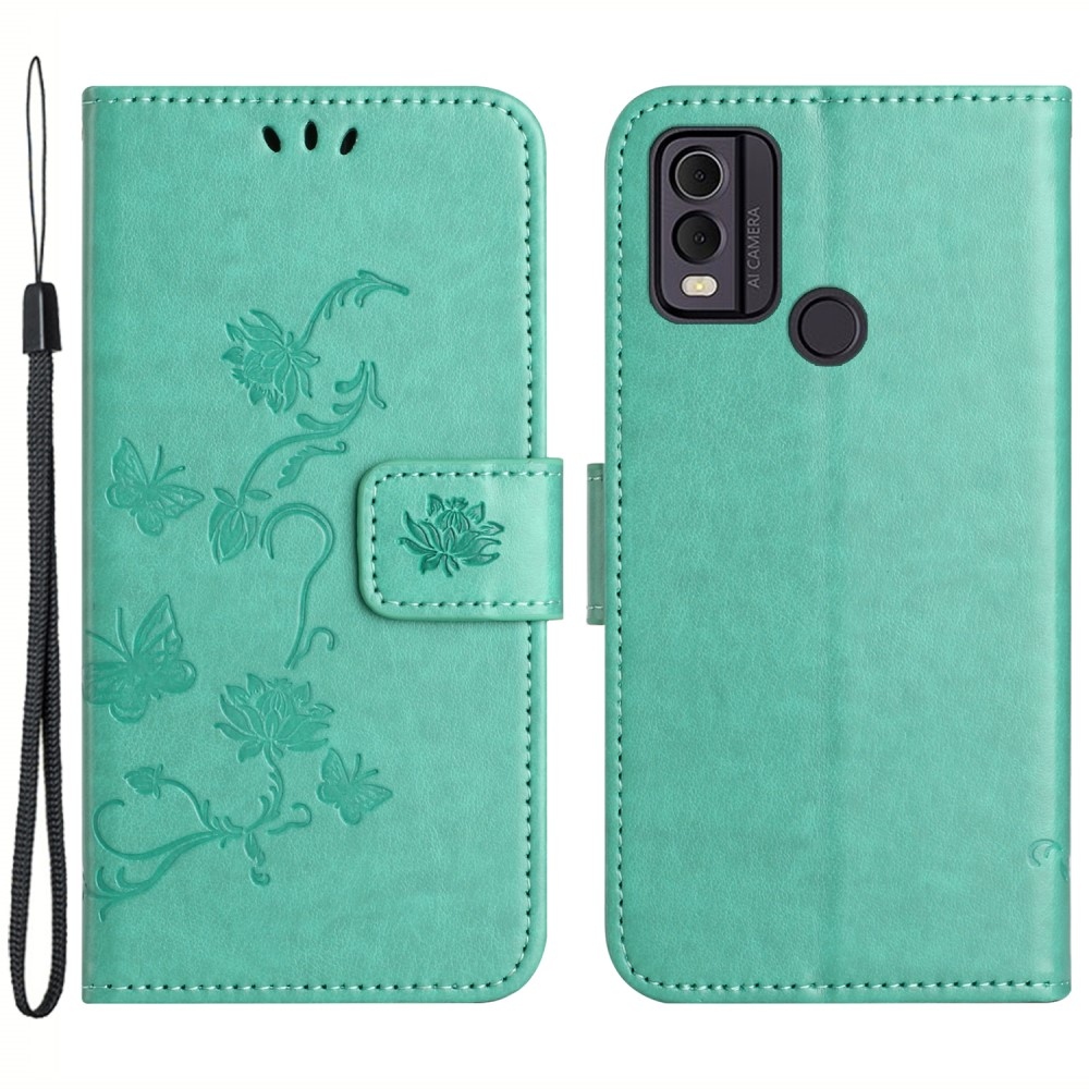 Virágos könyvtáska a Nokia C22 készülékhez - teáskék színű