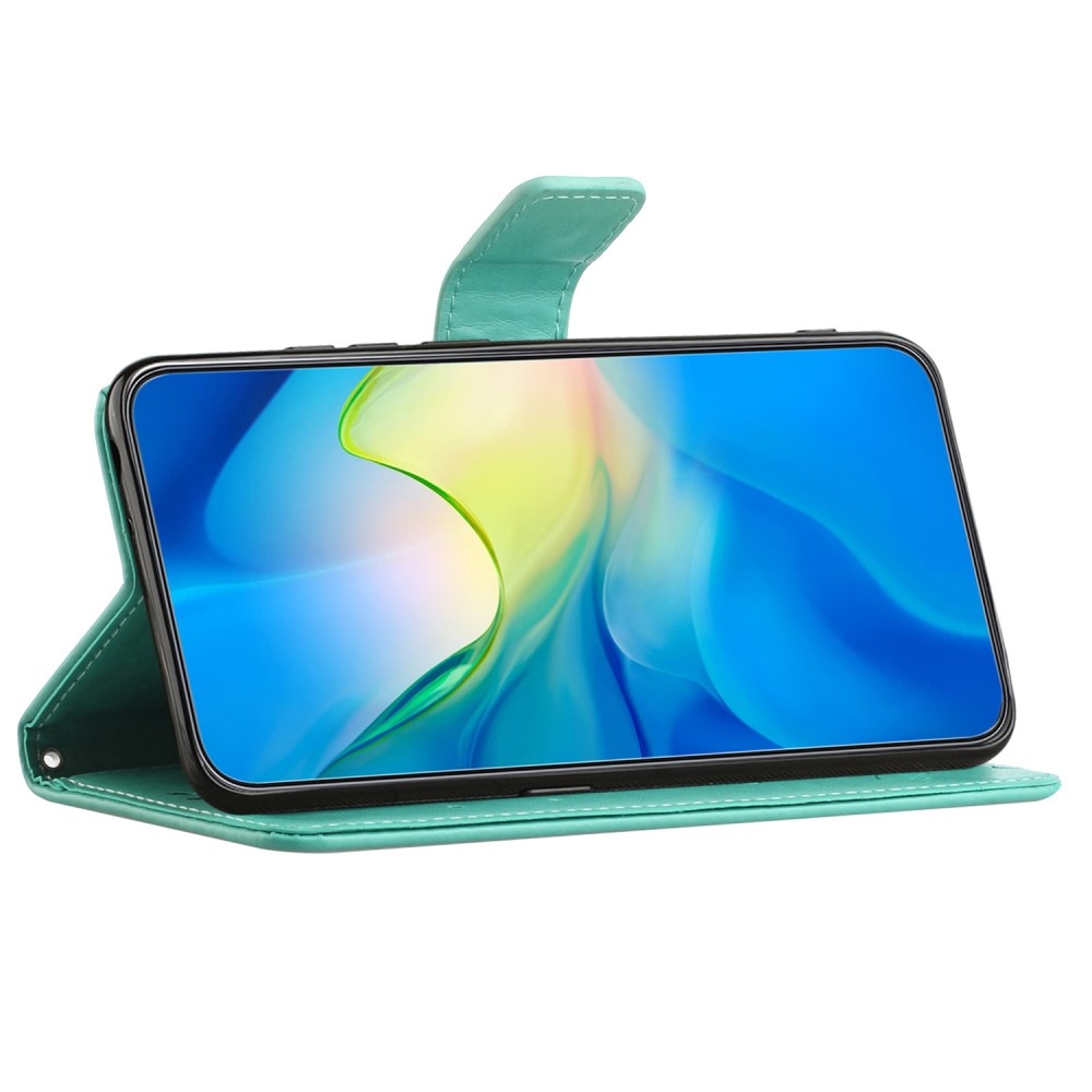 Virágos könyvtáska Samsung Galaxy Xcover 7 készülékhez - teal színű