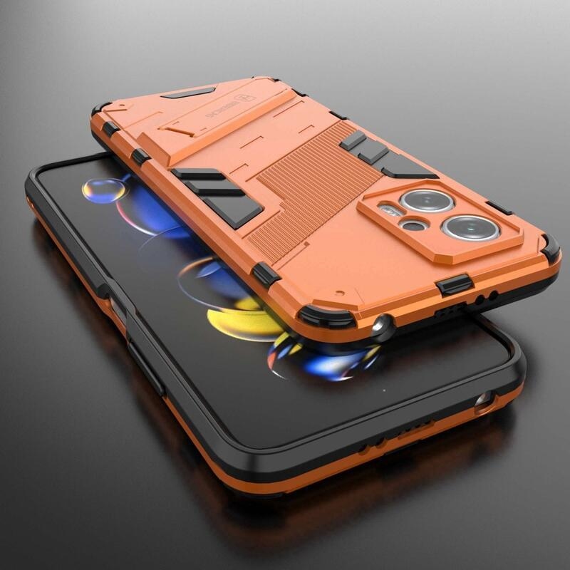 Héjálló hibrid borítás csuklós állvánnyal a Xiaomi Poco X4 GT 5G-hez - narancssárga